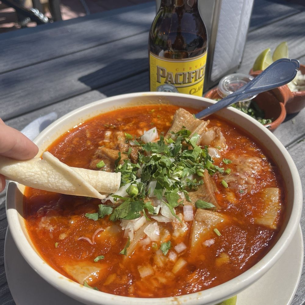 Mariscos El Pilar De Nayarit - Menudo with garnishings. - Mexican Near Me - Seaside, California Mariscos El Pilar De Nayarit - Menudo with garnishings. - Mexican Near Me - Seaside, California