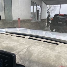 A Garden Hose sticking out of the ordering window A Garden Hose sticking out of the ordering window