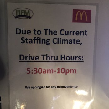 McDonald's - a sign for the current staffing climate drive thru hours - Fast Food Near Me - Dunn, North Carolina