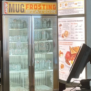 A&W - a beverage cooler with a menu in the background - Fast Food Near Me - Mississauga, Ontario A&W - a beverage cooler with a menu in the background - Fast Food Near Me - Mississauga, Ontario