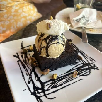 Driftless Glen Restaurant - Caramel pistachio brownie - New American Near Me - Baraboo, Wisconsin Driftless Glen Restaurant - Caramel pistachio brownie - New American Near Me - Baraboo, Wisconsin