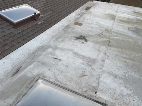 Slide of Balam Roofing