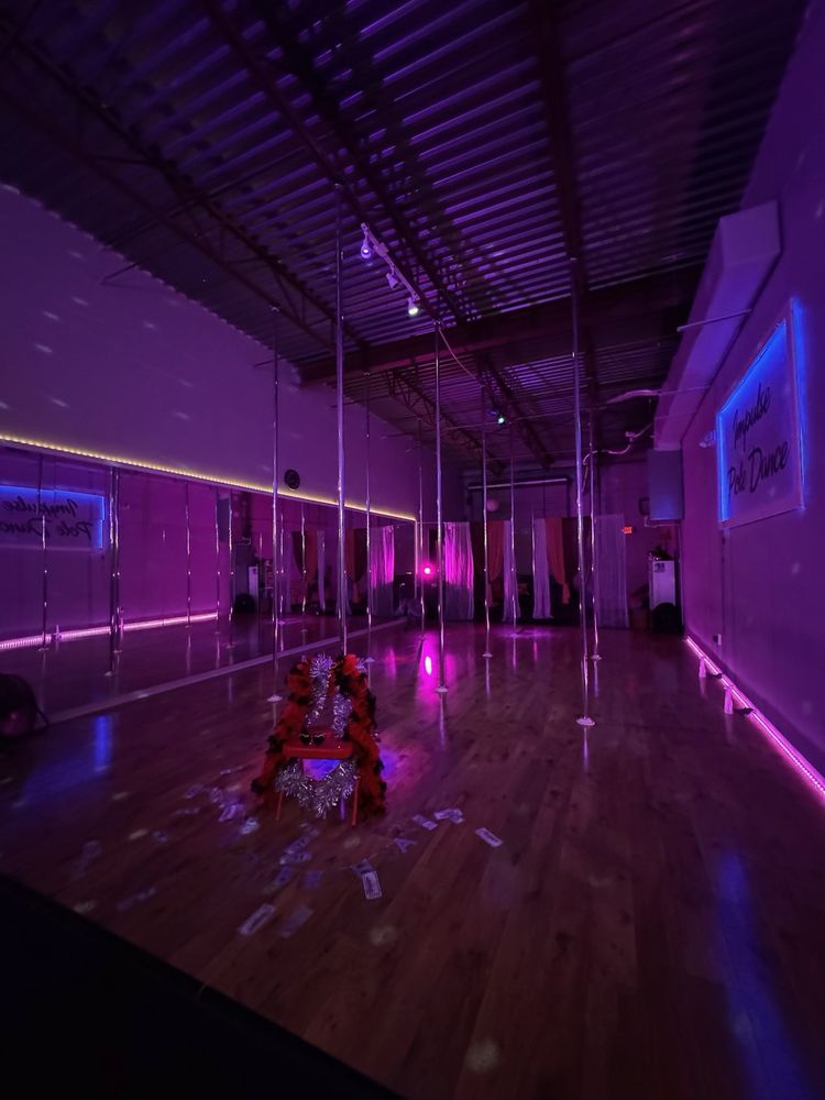 Impulse Studios Pole Dancing And Exotic Fitness Logo