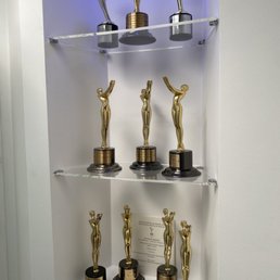 Acrylic shelves for trophies.
