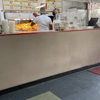Chicken Plus - a chef preparing food in a restaurant - Chicken Shop Near Me - Houston, Texas