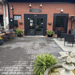 Entrance with patio seating. Entrance with patio seating.