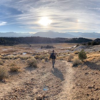 Travertine Hot Spring - Right past the first set of pools, this was my husband searching for a perfect place to watch the sunset together - Hot Springs Near Me Travertine Hot Spring - Right past the first set of pools, this was my husband searching for a perfect place to watch the sunset together - Hot Springs Near Me