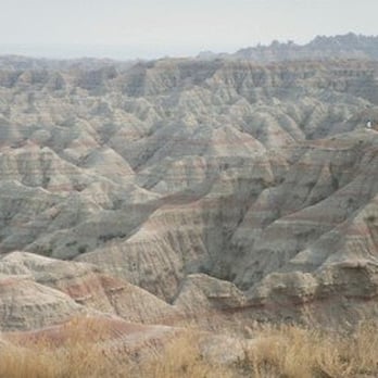 Badlands National Park - Those little dots on the mountain to the right are people. - Parks Near Me - Interior, South Dakota