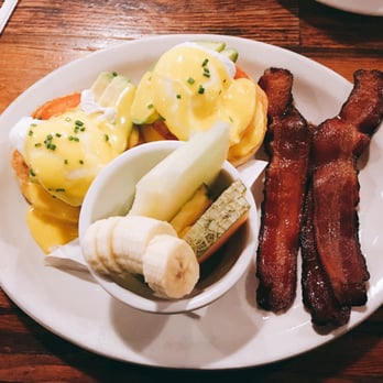 The Roost - Tomato + Avocado Eggs Benny with Fruit instead of Potatoes and a side of Bacon. - Breakfast & Brunch Near Me - Lawrence, Kansas The Roost - Tomato + Avocado Eggs Benny with Fruit instead of Potatoes and a side of Bacon. - Breakfast & Brunch Near Me - Lawrence, Kansas