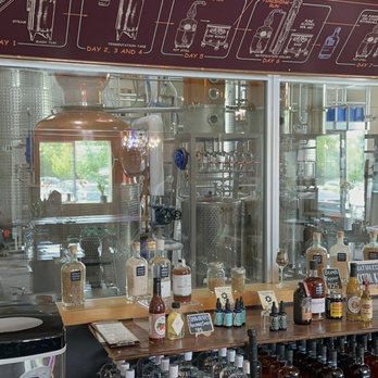 Spirit Works Distilling - Beautiful sitting for Sloe Gin tasting. Bar and Picture window of the distillery - Beer, Wine & Spirits Near Me Spirit Works Distilling - Beautiful sitting for Sloe Gin tasting. Bar and Picture window of the distillery - Beer, Wine & Spirits Near Me
