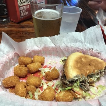 Beth's Burger Bar - Couldn't help take a few bites of my black and bleu burger pre-photo - American Near Me - Orlando, Florida Beth's Burger Bar - Couldn't help take a few bites of my black and bleu burger pre-photo - American Near Me - Orlando, Florida