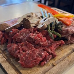 Two people platter ($99), meat choices: inner part of ribs, Galbi, beef tongue Two people platter ($99), meat choices: inner part of ribs, Galbi, beef tongue