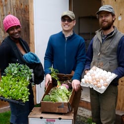 Tilth Alliance - Victoria, Chris and Matthew show off fresh produce and eggs for the Seattle Tilth CSA.
