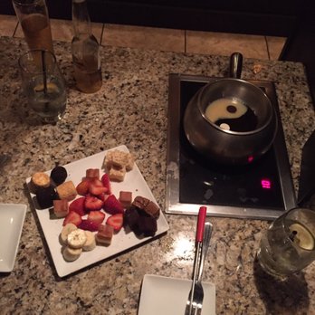 The Melting Pot - Our final course: yin and yang (dark and white chocolate) with wonderful dippers. - Fondue Near Me - Albuquerque, New Mexico The Melting Pot - Our final course: yin and yang (dark and white chocolate) with wonderful dippers. - Fondue Near Me - Albuquerque, New Mexico