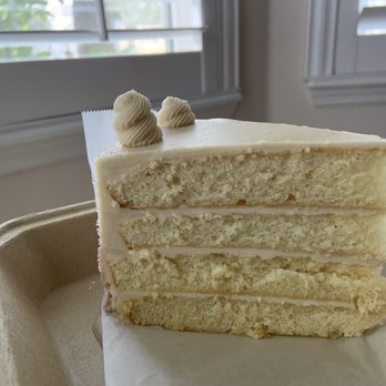 Biscottis - To go because I was too full.  Beautiful pink champagne cake. Moist yes, highly recommend. - American Near Me - Jacksonville, Florida