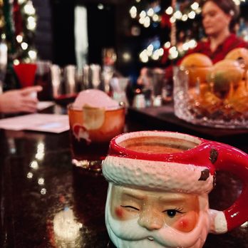 Miracle on 5th Street - Hot buttered rum (front) + snowball old fashioned (back) - Cocktail Bars Near Me - Austin, Texas Miracle on 5th Street - Hot buttered rum (front) + snowball old fashioned (back) - Cocktail Bars Near Me - Austin, Texas