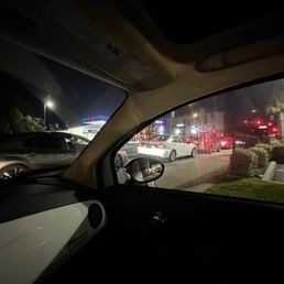 People can't traffic-control themselves. The line wraps around the street across 4 short blocks and blocks the exit. Add signs.