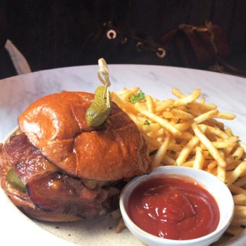 Due West - Dry aged burger with a whole lot of fries - Cocktail Bars Near Me - New York, New York Due West - Dry aged burger with a whole lot of fries - Cocktail Bars Near Me - New York, New York