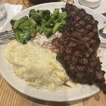 Carrabba's Italian Grill - Ribeyes with fettuccine and broccoli - Italian Near Me - Myrtle Beach, South Carolina