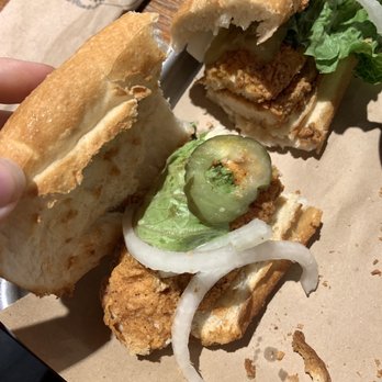 The Cajun Corner On Broad - Literally one pickle on an entire half of my sandwich that I got charged .50 cents for plus another 0.50 to add onion. - New American Near Me - Eufaula, Alabama