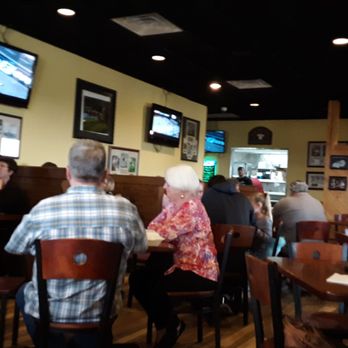 Stadium Grill - a group of people sitting at a table - American Near Me - Mattoon, Illinois
