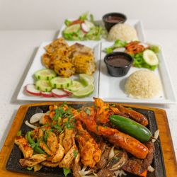 La Caverna Sports Bar & Grill - Parrillada familiar/ something to share with the family.