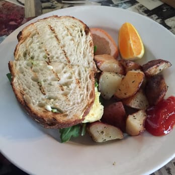 Americana - Egg & arugula sandwich. Make sure to add avocado! - New American Near Me - Seattle, Washington Americana - Egg & arugula sandwich. Make sure to add avocado! - New American Near Me - Seattle, Washington