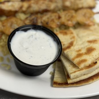 Souvlaki Grill II - Tangy tzatziki comes with the skewers. Yum - Greek Near Me - West Palm Beach, Florida Souvlaki Grill II - Tangy tzatziki comes with the skewers. Yum - Greek Near Me - West Palm Beach, Florida