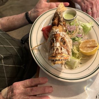Sazon Cuban Cuisine - Pargo Frito Entero. My father in law attacked this fish like it owed him money. - Cuban Near Me - Miami Beach, Florida Sazon Cuban Cuisine - Pargo Frito Entero. My father in law attacked this fish like it owed him money. - Cuban Near Me - Miami Beach, Florida