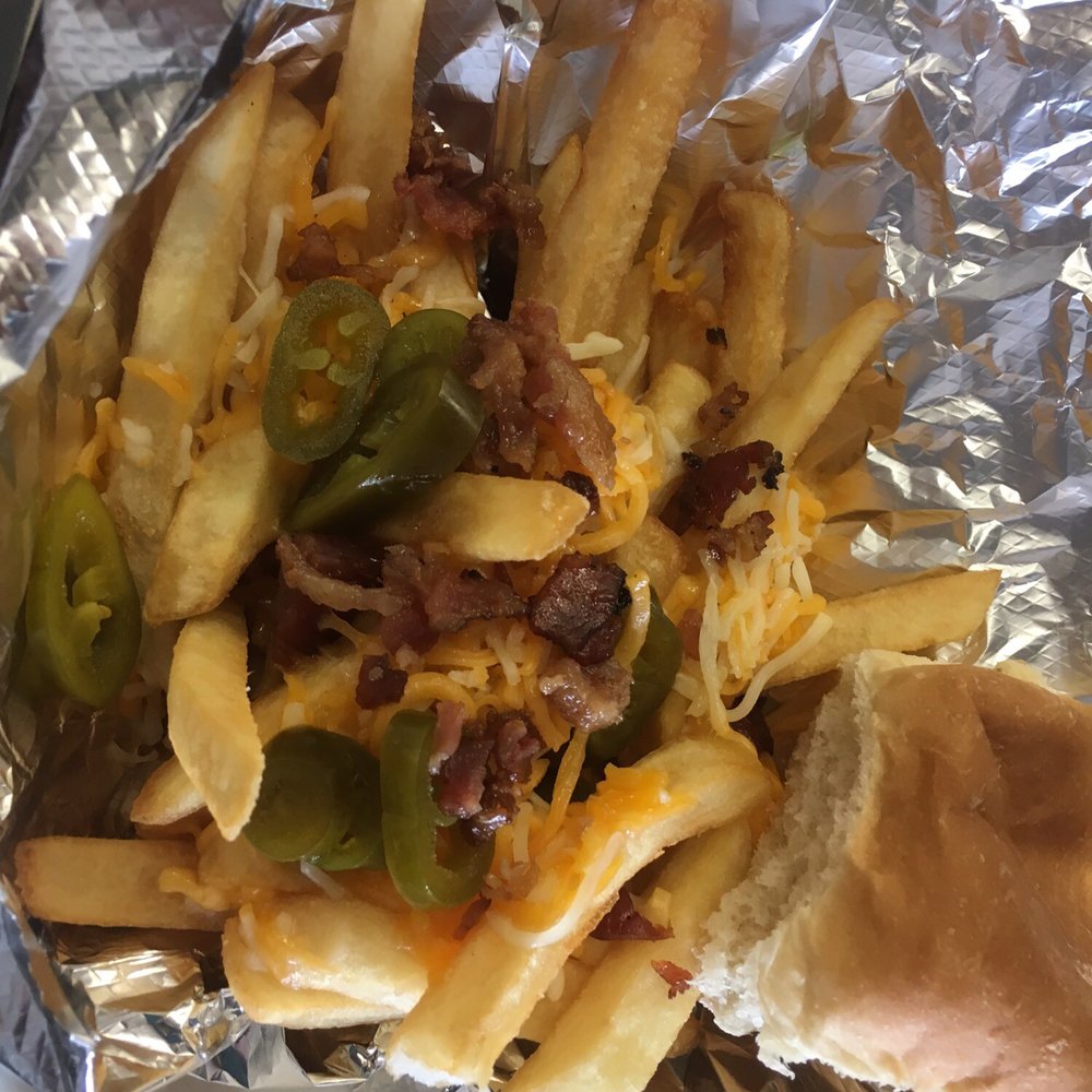 Riko's Kickin' Chicken - Loaded fries - Chicken Wings Near Me - Memphis, Tennessee Riko's Kickin' Chicken - Loaded fries - Chicken Wings Near Me - Memphis, Tennessee