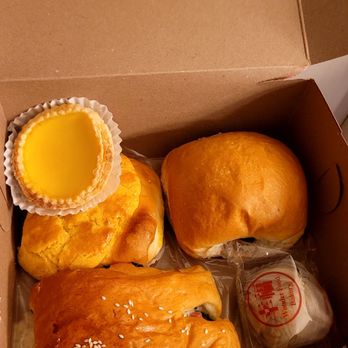Wonder Food Bakery - Clockwise: egg tart, custard bun, bbq pork bun, taro with salted egg, pineapple mooncake, ham and green onion bun. - Bakeries Near Me - Oakland, California Wonder Food Bakery - Clockwise: egg tart, custard bun, bbq pork bun, taro with salted egg, pineapple mooncake, ham and green onion bun. - Bakeries Near Me - Oakland, California
