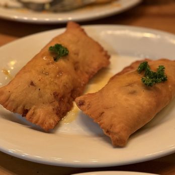 Tap Tap  Cuisine - Haitian Pate with ground beef filling, so juicy and flavorful! My favorite bite. - Caribbean Near Me - Portland, Oregon