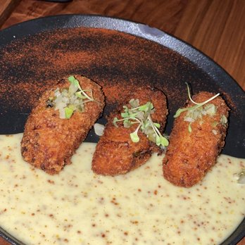 Unit B Eatery + Spirits - Cauliflower bacon croquets. Crispy on the outside. Creamy in the inside. Addicting - Tapas/Small Plates Near Me - Pembroke Pines, Florida Unit B Eatery + Spirits - Cauliflower bacon croquets. Crispy on the outside. Creamy in the inside. Addicting - Tapas/Small Plates Near Me - Pembroke Pines, Florida