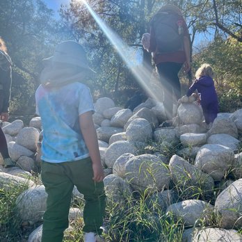 Earthroots Field School - hiking up to the meadow - Preschools Near Me