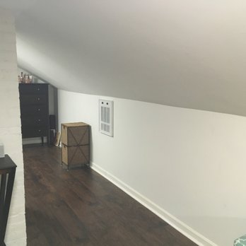 Paul Martin Services - After renovation - new floors, sheet rock, baseboard and paint. Love my new attic! - General Contractors Near Me