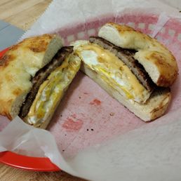sausage, egg, and cheese on cheddar. toasted...