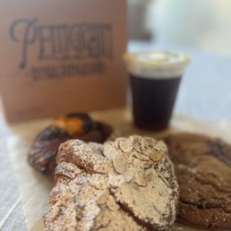 Almond croissant, cardamom bun, chocolate chip cookie, cold brew