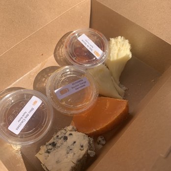 Beautiful Rind - Not a great pic (and partially consumed) but one of the 4 boxes of cheese we ordered. :) - Cheese Shops Near Me - Chicago, Illinois