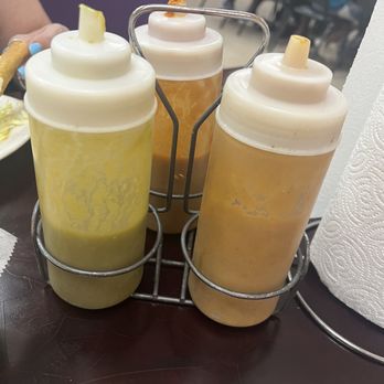 Mi Tierra - ATOMIC hot sauce! Don't try the one on the far right! - Tacos Near Me - Foley, Alabama