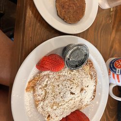 Tante Marie - Croissant French Toast and a side of sausage.