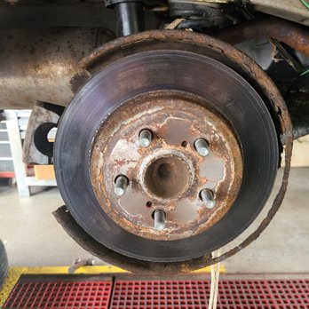 Jiffy Lube - My rotor on the working brake caliper, passenger side. Showed to me by Jiffy Lube tech. - Auto Repair Near Me - Feeding Hills, Massachusetts Jiffy Lube - My rotor on the working brake caliper, passenger side. Showed to me by Jiffy Lube tech. - Auto Repair Near Me - Feeding Hills, Massachusetts