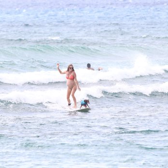 Photography by Willi Edwards - pregnant surfing with dog - Session Photography Near Me Photography by Willi Edwards - pregnant surfing with dog - Session Photography Near Me