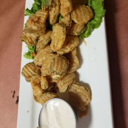 Pablo's Steaks & More - Fried pickles with ranch dressing and Ceasar salad