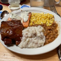 Cabin Nite Dinner Theater - 2022 dinner plate - all you can eat, served family-style at your table.  Salmon, ribs, potatoes, beans, corn, biscuits
