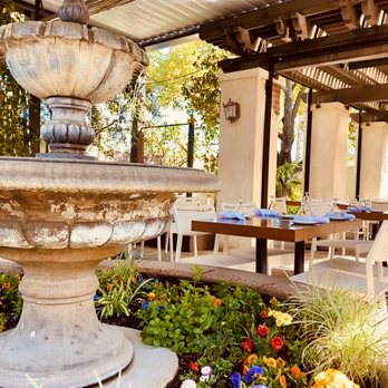 Pietro's - Garden patio seating with heat lamps and a fireplace. - Italian Near Me - Lodi, California