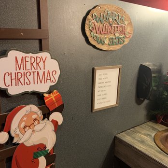 Vindicktive Wings - Christmas themed bathroom - Chicken Wings Near Me - Seattle, Washington Vindicktive Wings - Christmas themed bathroom - Chicken Wings Near Me - Seattle, Washington