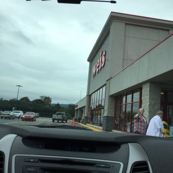 Weis Markets - a man and a woman walking out of a store - Grocery Near Me - Montoursville, Pennsylvania Weis Markets - a man and a woman walking out of a store - Grocery Near Me - Montoursville, Pennsylvania