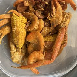 Crabs corn shrimp potato and sausage.