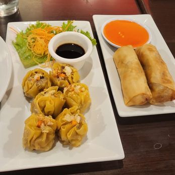 Bangkok 54 Restaurant - Egg rolls and dumplings with sauces. - Thai Near Me - Arlington, Virginia Bangkok 54 Restaurant - Egg rolls and dumplings with sauces. - Thai Near Me - Arlington, Virginia