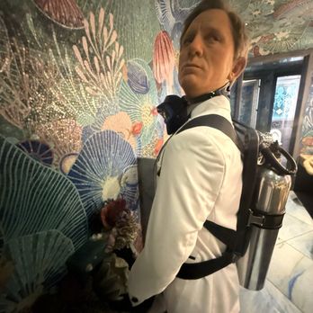 Sexy Fish - James Bond in the men's restroom - Seafood Near Me - Miami, Florida